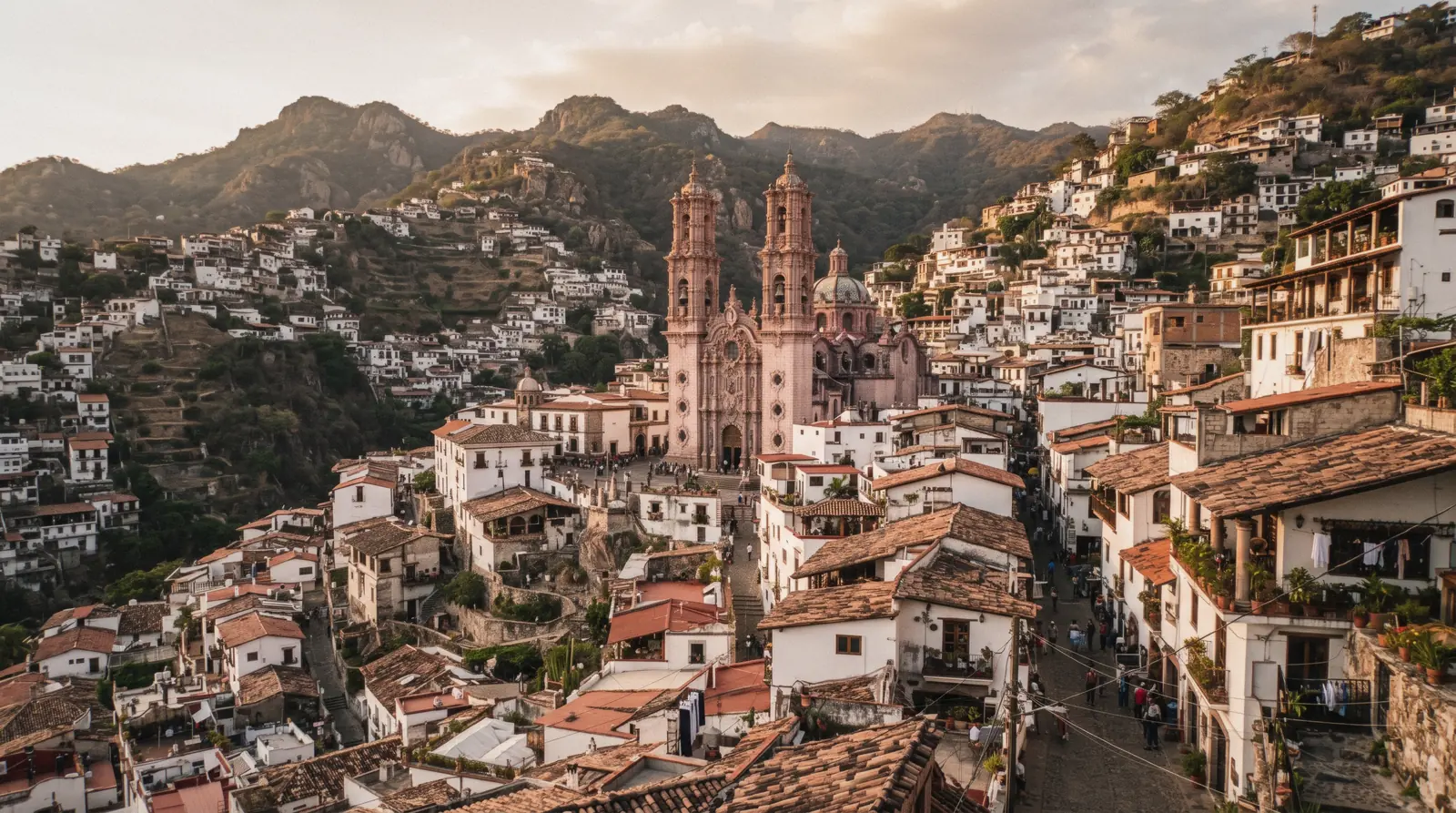 White houses stacked up the mountainside around the twin towers of Santa Prisca in Taxco, a day trip from Mexico City
